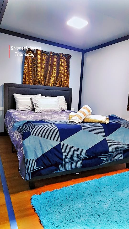 A 2 bedroom House,fully equipped Kitchenette,laundry area,Fully Air-conditioned available for your convenience.